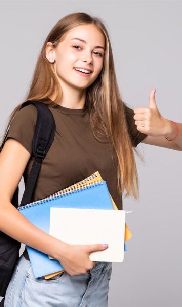 Young student woman with backpack bag holding hand with thumb up gesture over white background